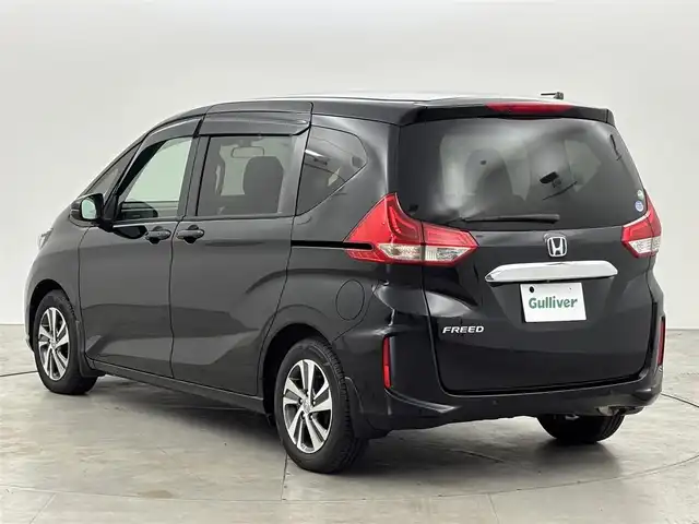 ホンダ フリード G ホンダセンシング 福岡県 2020(令2)年 4.2万km クリスタルブラックパール 純正９インチナビ　/ＥＴＣ　/バックカメラ　/両側パワースライドドア　/前後ドライブレコーダー　/前席シートヒーター　/レーダークルーズコントロール　/プリクラッシュセーフティ　/レーンキープ　/純正１５インチＡＷ
