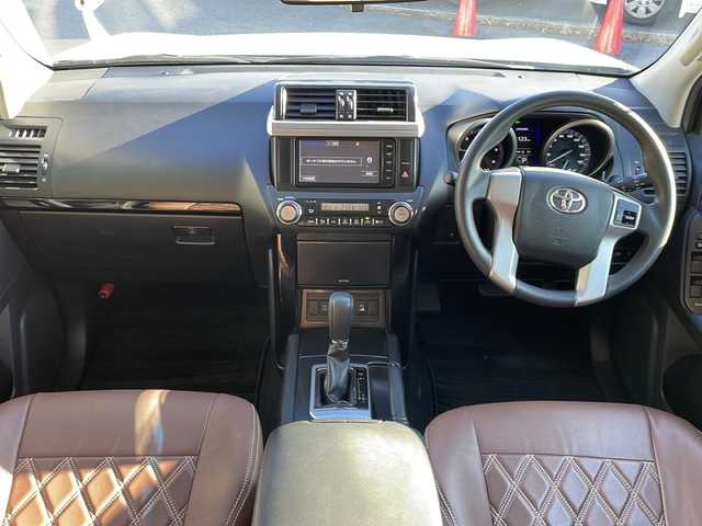 トヨタ ランドクルーザー プラド TX 長野県 2016(平28)年 7.6万km ホワイトパールクリスタルシャイン ４ＷＤ/ディーゼル/純正メモリナビフルセグTV/バックカメラ/ETC/社外FUEL17インチアルミ/ヨコハマジオランダータイヤ/ブラウンレザー調シート/プッシュスタート/コーナーセンサー/保証書・取説/スペアキー