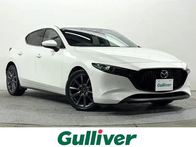 マツダ マツダ３ファストバック 15S ツーリング 大阪府 2019(令1)年 3.2万km スノーフレイクホワイトパールマイカ 純正8.8incナビTV 360カメラ レーダークルコン 衝突軽減ブレーキ レーンアシスト ブラインドSM ヘッドアップディスプレイ オートライト LEDヘッドライト スマートキー プッシュスタート クリアランスソナー ETC