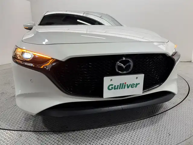 マツダ マツダ３ファストバック 15S ツーリング 大阪府 2019(令1)年 3.2万km スノーフレイクホワイトパールマイカ 純正8.8incナビTV 360カメラ レーダークルコン 衝突軽減ブレーキ レーンアシスト ブラインドSM ヘッドアップディスプレイ オートライト LEDヘッドライト スマートキー プッシュスタート クリアランスソナー ETC