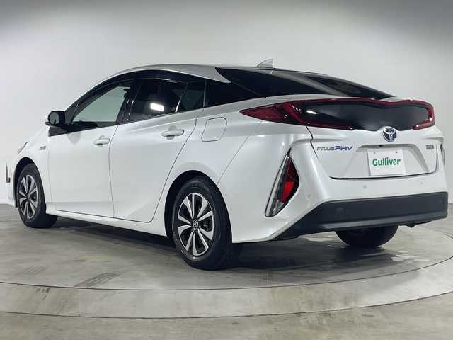 トヨタ プリウス ＰＨＶ A プレミアム 福岡県 2021(令3)年 2.3万km プラチナホワイトパールマイカ 禁煙車/純正9インチメモリーナビゲーション/フルセグテレビ/全方位モニター/レーダークルーズコントロール/本革シート/ドライブレコーダー前後/LEDヘッドライト/ブラインドスポットモニター/ヘッドアップディスプレイ/ハンドルヒーター/パワーシート/オートライト/オートハイビーム/ETC/革巻きステアリング
