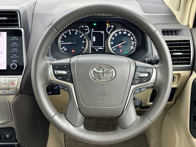 トヨタ ランドクルーザー プラド TX Lパッケージ 愛知県 2023(令5)年 4.9万km ホワイトパールクリスタルシャイン 純正メモリナビ/・フルセグ/・Bluetooth/・AppleCarPlay/・AndroidAuto/トヨタセーフティセンス/　・プリクラッシュセーフティ/　・レーンディパーチャーアラート/　・オートマチックハイビーム/　・レーダークルーズコントロール/サンルーフ/パノラミックビューモニター/バックカメラ/LEDオートライト/フォグランプ/レザーシート/パワーシート/シートヒーター　/エアシート　/純正19インチアルミホイール　/ブラインドスポットモニター/パーキングサポートブレーキ/ルーフレール/クリアランスソナー/スマートキー/ビルドインETC2.0/ヘッドライトウォッシャー/スペアキー