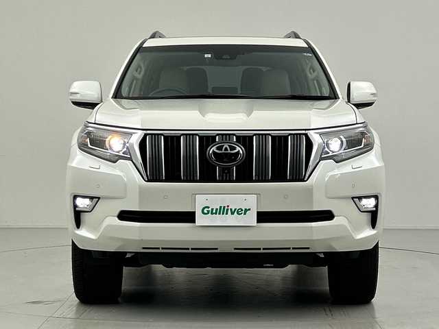 トヨタ ランドクルーザー プラド TX Lパッケージ 愛知県 2023(令5)年 4.9万km ホワイトパールクリスタルシャイン 純正メモリナビ/・フルセグ/・Bluetooth/・AppleCarPlay/・AndroidAuto/トヨタセーフティセンス/　・プリクラッシュセーフティ/　・レーンディパーチャーアラート/　・オートマチックハイビーム/　・レーダークルーズコントロール/サンルーフ/パノラミックビューモニター/バックカメラ/LEDオートライト/フォグランプ/レザーシート/パワーシート/シートヒーター　/エアシート　/純正19インチアルミホイール　/ブラインドスポットモニター/パーキングサポートブレーキ/ルーフレール/クリアランスソナー/スマートキー/ビルドインETC2.0/ヘッドライトウォッシャー/スペアキー