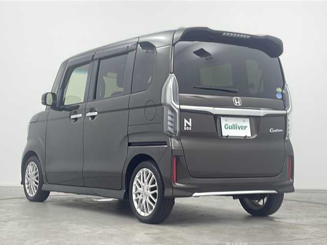 ホンダ Ｎ ＢＯＸ カスタム L ターボ 三重県 2021(令3)年 3.3万km プレミアムグラマラスブロンズP 禁煙車/純正7インチナビ/　フルセグTV/CD/DVD/Bluetooth/両側パワースライドドア/ホンダセンシング/衝突軽減ブレーキシステム/レーンキープアシストシステム/レーダークルーズコントロール/前席シートヒーター/純正ヘッドライト/バックカメラ/革巻きステアリング/コーナーセンサー/ETC
