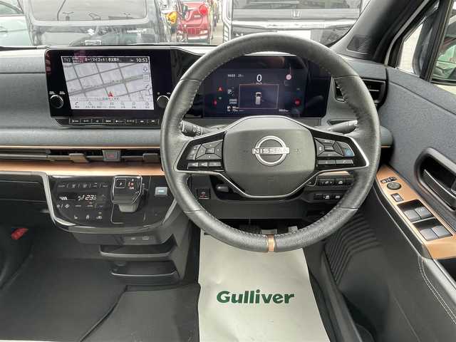日産 サクラ G 群馬県 2023(令5)年 1万km アメジストブラック/シルキーホワイト ワンオーナー/純正カーナビ/フルセグテレビ/バックカメラ/全方位カメラ/プロパイロット/クルーズコントロー/ビルドインETC/Bluetooth接続/ハンドルヒーター/充電コードあり/保証書あり/整備手帳あり/取扱説明書あり