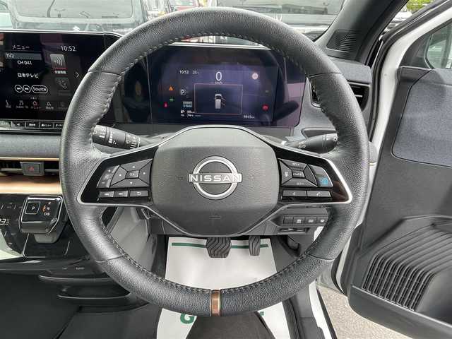 日産 サクラ G 群馬県 2023(令5)年 1万km アメジストブラック/シルキーホワイト ワンオーナー/純正カーナビ/フルセグテレビ/バックカメラ/全方位カメラ/プロパイロット/クルーズコントロー/ビルドインETC/Bluetooth接続/ハンドルヒーター/充電コードあり/保証書あり/整備手帳あり/取扱説明書あり