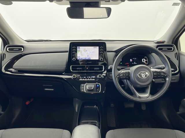 トヨタ アクア G 秋田県 2024(令6)年 2.3万km プラチナホワイトパールマイカ 4WD/純正ナビ　/AM／FM／Bluetooth/衝突被害軽減システム/バックカメラ　/寒冷地仕様/ワイパーデアイサー　/レーダークルーズコントロール　/レーンキープアシスト　/横滑り防止装置/パーキングサポートブレーキ/クリアランスソナー/先行車発進告知/ドラレコ一体型ルームミラー　/ＥＴＣ　/ＬＥＤヘッドライト　/オートマチックハイビーム/革巻きステアリング/AC100V/純正ホイールキャップ/スマートキー
