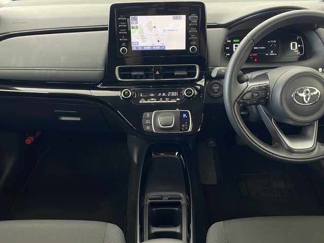 トヨタ アクア G 秋田県 2024(令6)年 2.3万km プラチナホワイトパールマイカ 4WD/純正ナビ　/AM／FM／Bluetooth/衝突被害軽減システム/バックカメラ　/寒冷地仕様/ワイパーデアイサー　/レーダークルーズコントロール　/レーンキープアシスト　/横滑り防止装置/パーキングサポートブレーキ/クリアランスソナー/先行車発進告知/ドラレコ一体型ルームミラー　/ＥＴＣ　/ＬＥＤヘッドライト　/オートマチックハイビーム/革巻きステアリング/AC100V/純正ホイールキャップ/スマートキー