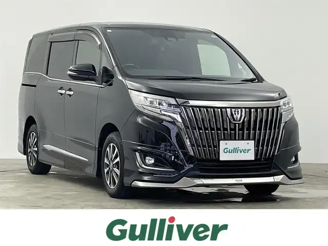 トヨタ エスクァイア Gi プレミアムパッケージ ブラックテーラード 千葉県 2020(令2)年 4.1万km ブラック トヨタセーフティセンス/・プリクラッシュセーフティ/・レーントレーシングアシスト/・レーンディパーチャーアラート/・レーダークルーズコントロール/・オートマチックハイビーム/・ロードサインアシスト/純正10インチSDナビ/（CD/DVD/Bluetooth/USB/HDMI/フルセグ）/バックカメラ/両側パワースライドドア/ハーフレザーシート/D/N席シートヒーター/MTモード付AT/プッシュスタート/アイドリングストップ/オートライト/ダブルエアコン/電動格納ミラー/ビルトインETC/革巻きステアリング/ステアリングスイッチ/ステアリングヒーター/ミラー型前後ドライブレコーダー/純正フロアマット/純正ドアバイザー/純正15インチAW/LED/F/Rコーナーセンサー
