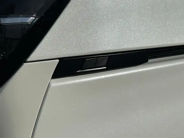 トヨタ ヴォクシー ハイブリッド S－Z 福岡県 2022(令4)年 6万km ホワイトパールクリスタルシャイン ワンオーナー/純正10.5インチDA/純正14インチフリップダウンモニター/モデリスタシグネチャーイルミグリル/トヨタセーフティセンス/アドバンスドパーク/レーダークルーズコントロール/アラウンドビューモニター/ブラインドスポットモニター/プロアクティブドライビングアシスト/リアクロストラフィックアラート/リアカメラディテクション/パーキングサポートブレーキ/安心降車アシスト/ハンズフリーデュアルパワースライドドア/ロードサインアシスト/レーンチェンジアシスト/フロントクロストラフィックアラート/ヘッドアップディスプレイ/電動パーキングブレーキ/オートホールド/オートマチックハイビーム/前席＋後席シートヒーター/ハンドルヒーター/パワーバックドア/デジタルインナーミラー/前方ドラレコ/ETC2.0