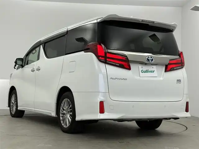 トヨタ アルファードハイブリット S タイプゴールドⅡ 愛知県 2021(令3)年 2.3万km ホワイトパールクリスタルシャイン ワンオーナー/4WD/トヨタセーフティーセンス/・衝突被害軽減システム/・レーダークルーズコントロール/・レーントレーシングアシスト/・横滑り防止装置/純正ナビ/・Bluetoot/・フルセグTV/・バックカメラ/ブラインドスポットモニター/デジタルインナーミラー/ビルトインETC/オートマチックハイビーム/オートライト/三眼LEDヘッドライト/LEDフォグランプ/パワーバックドア/両側パワースライドドア/純正17インチAW/純正フロアマット/プッシュスタート