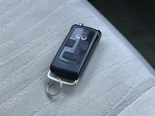 日産 フーガ 370GT FOUR 青森県 2017(平29)年 8.7万km ダークブルー ４WD/純正ナビ/フルセグTV/CD/DVD/BT/ドライブレコーダー/純正エンジンスターター/ETC/後席モニター/D席シートメモリ/前席パワーシート/オートライト/クルーズコントロール/オートライト