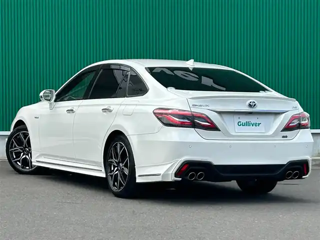 トヨタ クラウン ハイブリッド RS アドバンス 宮城県 2018(平30)年 2.1万km ホワイトパールクリスタルシャイン 登録時20941km/純正エアロ（フロント/サイド/リア）/Weds LEONIS　18インチAW/セーフティセンス/・レーントレーシングアシスト/・レーダークルーズコントロール/・プリクラッシュセーフティ/・アダプティブハイビームシステム/・ロードサインアシスト/・先行車発進告知機能/ブラインドスポットモニター/リアクロストラフィックオートブレーキ/リアクロストラフィックアラート/純正SD8インチナビ/・フルセグ/DVD/M-SD/USB/Bluetooth/10スピーカーサウンドシステム/バックカメラ/カラーヘッドアップディスプレイ/ハーフレザーシート/シートヒーター/ステアリングヒーター/パワーシート（運転席メモリー機能付）/パドルシフト付革巻きステア/ステアリングスイッチ/電動パーキングブレーキ/ブレーキホールド/3眼LEDオートヘッドライト/シーケンシャルターンランプ/スマートキー＆プッシュスタート/スペアキー1本/ビルトインETC2.0/AC100V/100Wコンセント/フロアマット/ドアバイザー/W/サイド/カーテン/ニーエアバッグ/禁煙車