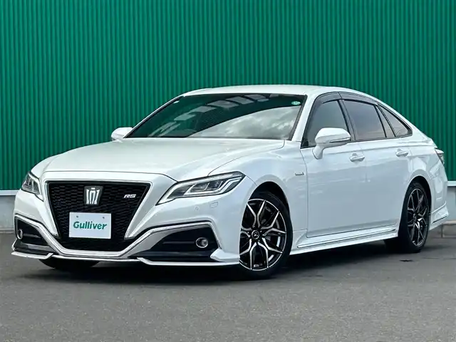 トヨタ クラウン ハイブリッド RS アドバンス 宮城県 2018(平30)年 2.1万km ホワイトパールクリスタルシャイン 登録時20941km/純正エアロ（フロント/サイド/リア）/Weds LEONIS　18インチAW/セーフティセンス/・レーントレーシングアシスト/・レーダークルーズコントロール/・プリクラッシュセーフティ/・アダプティブハイビームシステム/・ロードサインアシスト/・先行車発進告知機能/ブラインドスポットモニター/リアクロストラフィックオートブレーキ/リアクロストラフィックアラート/純正SD8インチナビ/・フルセグ/DVD/M-SD/USB/Bluetooth/10スピーカーサウンドシステム/バックカメラ/カラーヘッドアップディスプレイ/ハーフレザーシート/シートヒーター/ステアリングヒーター/パワーシート（運転席メモリー機能付）/パドルシフト付革巻きステア/ステアリングスイッチ/電動パーキングブレーキ/ブレーキホールド/3眼LEDオートヘッドライト/シーケンシャルターンランプ/スマートキー＆プッシュスタート/スペアキー1本/ビルトインETC2.0/AC100V/100Wコンセント/フロアマット/ドアバイザー/W/サイド/カーテン/ニーエアバッグ/禁煙車