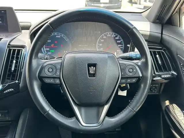 トヨタ クラウン ハイブリッド RS アドバンス 宮城県 2018(平30)年 2.1万km ホワイトパールクリスタルシャイン 登録時20941km/純正エアロ（フロント/サイド/リア）/Weds LEONIS　18インチAW/セーフティセンス/・レーントレーシングアシスト/・レーダークルーズコントロール/・プリクラッシュセーフティ/・アダプティブハイビームシステム/・ロードサインアシスト/・先行車発進告知機能/ブラインドスポットモニター/リアクロストラフィックオートブレーキ/リアクロストラフィックアラート/純正SD8インチナビ/・フルセグ/DVD/M-SD/USB/Bluetooth/10スピーカーサウンドシステム/バックカメラ/カラーヘッドアップディスプレイ/ハーフレザーシート/シートヒーター/ステアリングヒーター/パワーシート（運転席メモリー機能付）/パドルシフト付革巻きステア/ステアリングスイッチ/電動パーキングブレーキ/ブレーキホールド/3眼LEDオートヘッドライト/シーケンシャルターンランプ/スマートキー＆プッシュスタート/スペアキー1本/ビルトインETC2.0/AC100V/100Wコンセント/フロアマット/ドアバイザー/W/サイド/カーテン/ニーエアバッグ/禁煙車