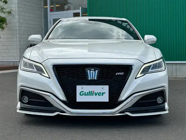 トヨタ クラウン ハイブリッド RS アドバンス 宮城県 2018(平30)年 2.1万km ホワイトパールクリスタルシャイン 登録時20941km/純正エアロ（フロント/サイド/リア）/Weds LEONIS　18インチAW/セーフティセンス/・レーントレーシングアシスト/・レーダークルーズコントロール/・プリクラッシュセーフティ/・アダプティブハイビームシステム/・ロードサインアシスト/・先行車発進告知機能/ブラインドスポットモニター/リアクロストラフィックオートブレーキ/リアクロストラフィックアラート/純正SD8インチナビ/・フルセグ/DVD/M-SD/USB/Bluetooth/10スピーカーサウンドシステム/バックカメラ/カラーヘッドアップディスプレイ/ハーフレザーシート/シートヒーター/ステアリングヒーター/パワーシート（運転席メモリー機能付）/パドルシフト付革巻きステア/ステアリングスイッチ/電動パーキングブレーキ/ブレーキホールド/3眼LEDオートヘッドライト/シーケンシャルターンランプ/スマートキー＆プッシュスタート/スペアキー1本/ビルトインETC2.0/AC100V/100Wコンセント/フロアマット/ドアバイザー/W/サイド/カーテン/ニーエアバッグ/禁煙車