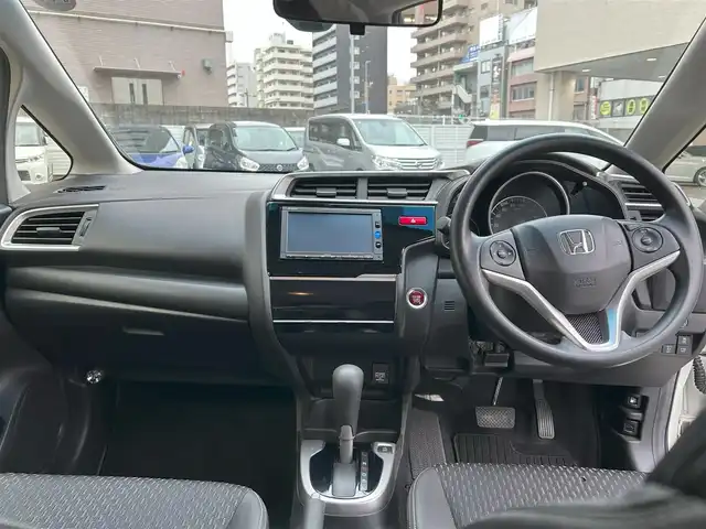 ホンダ フィット 13G Lパッケージ ファインED 神奈川県 2017(平29)年 2.2万km プレミアムホワイトパールⅡ 純正ナビ＆ワンセグTV/・CD/SD/BT/クルーズコントロール/ハーフレザーシート/CTBA(シティ・ブレーキ・アクティブ・システム）/オートライト/オート電動格納ミラー/スマートキー/プッシュスタート/Wエアバック/横滑り防止装置/ABS/ドアバイザー/フロアマット/保証書/取扱説明書/スペアキー有