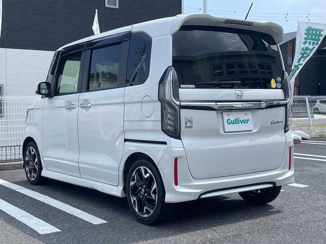 ホンダ Ｎ ＢＯＸ 三重県 2020(令2)年 2万km プラチナホワイトパール 登録時19957km/ワンオーナー/禁煙車/ハーフレザーシート/純正ナビ/（AM/FM/TV/Bluetooth/CD/DVD/HDMI）/フルセグＴＶ/バックカメラ/ビルトインＥＴＣ/レーダークルコン/両側パワースライドドア/純正ドラレコ/ステアリングスイッチ/パドルシフト/シートヒーター/衝突軽減システム/レーンキープアシスト/コーナーセンサー/プッシュスタート/純正フロアマット/スペアキー