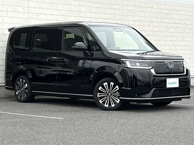 ホンダ ステップワゴン スパーダ eHEV プレミアムライン 茨城県 2022(令4)年 5万km クリスタルブラックパール 純正11.4インチナビ【LXM-247VFLi】/(地デジTV・BT・USB・ラジオ再生)/後席15.6インチフリップダウンモニター/両側パワースライドドア/HONDA SENSING/・アダプティブクルーズコントロール/・衝突軽減ブレーキ/・車線維持支援システム/・誤発進抑制機能/・先行車発進お知らせ機能/・オートハイビーム/・標識認識機能/コーナーセンサー/電動リアゲート/ハーフレザーシート/シートヒーター/アラウンドビューカメラ/ドライブレコーダー/ETC/オートライト/LEDヘッドライト/純正17inアルミホイール/純正フロアマット/スマートキー/スペアキー