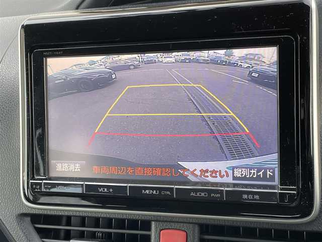 トヨタ ヴォクシー ハイブリッド X 東京都 2015(平27)年 10.6万km ダークバイオレットマイカメタリック 純正ナビ　/ＣＤ　/Ｂｌｕｅｔｏｏｔｈ　/ＤＶＤ　/バックカメラ　/両側電動スライドドア　/フリップダウンモニター　/前後ドライブレコーダー　/ＥＴＣ　/テレビキャンセラー　/純正アルミホイール　/衝突被害軽減ブレーキ/ABS/横滑り防止装置/オートライト