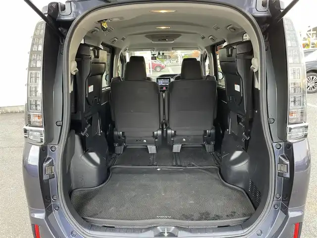 トヨタ ヴォクシー ハイブリッド X 東京都 2015(平27)年 10.6万km ダークバイオレットマイカメタリック 純正ナビ　/ＣＤ　/Ｂｌｕｅｔｏｏｔｈ　/ＤＶＤ　/バックカメラ　/両側電動スライドドア　/フリップダウンモニター　/前後ドライブレコーダー　/ＥＴＣ　/テレビキャンセラー　/純正アルミホイール　/衝突被害軽減ブレーキ/ABS/横滑り防止装置/オートライト