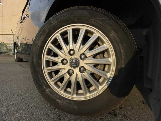 トヨタ ヴォクシー ハイブリッド X 東京都 2015(平27)年 10.6万km ダークバイオレットマイカメタリック 純正ナビ　/ＣＤ　/Ｂｌｕｅｔｏｏｔｈ　/ＤＶＤ　/バックカメラ　/両側電動スライドドア　/フリップダウンモニター　/前後ドライブレコーダー　/ＥＴＣ　/テレビキャンセラー　/純正アルミホイール　/衝突被害軽減ブレーキ/ABS/横滑り防止装置/オートライト