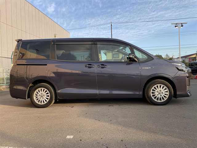 トヨタ ヴォクシー ハイブリッド X 東京都 2015(平27)年 10.6万km ダークバイオレットマイカメタリック 純正ナビ　/ＣＤ　/Ｂｌｕｅｔｏｏｔｈ　/ＤＶＤ　/バックカメラ　/両側電動スライドドア　/フリップダウンモニター　/前後ドライブレコーダー　/ＥＴＣ　/テレビキャンセラー　/純正アルミホイール　/衝突被害軽減ブレーキ/ABS/横滑り防止装置/オートライト