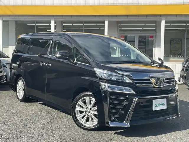 トヨタ ヴェルファイア Z 千葉県 2018(平30)年 6.4万km バーニングブラッククリスタルシャインガラスフレーク ワンオーナー/ALPINE11インチメモリーナビ(EX11Z)/・フルセグTV/CD/DVD/BT/ALPINE12.8インチフリップダウンモニター(PXH12X-R)/バックカメラ/ビルトインETC2.0/両側パワースライドドア/クリアランスソナー/LTA/PCS/RSA/オートマチックハイビーム/レーダークルーズコントロール/セカンドシートオットマン機能/スマートキー/純正18インチAW/LEDヘッドライト/フォグランプ/ドアバイザー/フロアマット/保証書/H30~R7年トヨタ整備記録有り/取扱説明書(車両/ナビ)