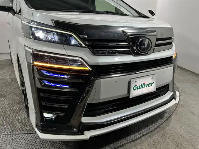 トヨタ ヴェルファイア Z Gエディション 大阪府 2019(平31)年 3.9万km ホワイトパールクリスタルシャイン サンルーフ　黒革シート　後席モニター　社外エアロ　純正１０ｉｎｃナビＴＶ　Ｂカメラ　三眼ＬＥＤ　パワーシート／ヒーター／エアコン　電動リアゲート　衝突軽減　レーダーＣ　ＢＳＭ　前後ドラレコ
