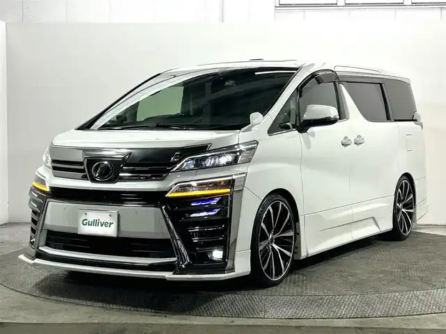 トヨタ ヴェルファイア Z Gエディション 大阪府 2019(平31)年 3.9万km ホワイトパールクリスタルシャイン サンルーフ　黒革シート　後席モニター　社外エアロ　純正１０ｉｎｃナビＴＶ　Ｂカメラ　三眼ＬＥＤ　パワーシート／ヒーター／エアコン　電動リアゲート　衝突軽減　レーダーＣ　ＢＳＭ　前後ドラレコ
