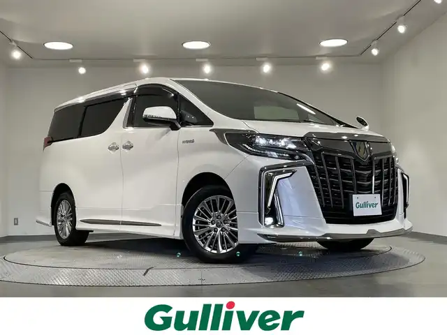 トヨタ アルファードハイブリット S タイプゴールド 愛知県 2020(令2)年 8.9万km ホワイトパールクリスタルシャイン 純正９インチディスプレイオーディオ/モデリスタエアロ/パワーバックドア/衝突軽減ブレーキ/レーントレーシングアシスト/クリアランスソナー/レーダークルーズコントロール/三眼ＬＥＤヘッドライト/バックカメラ　/ドライブレコーダー/ハーフレザーシート/ＥＴＣ