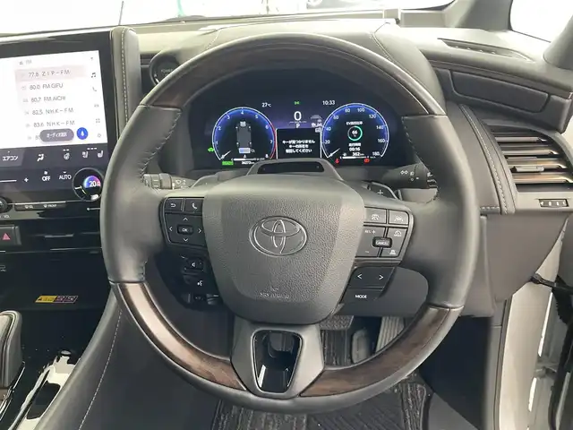 トヨタ アルファードハイブリット Z 愛知県 2023(令5)年 3.7万km プラチナホワイトパールマイカ メーカー14インチDA/（AM/FM/BT/フルセグTV）/13.2型有機EL後席ディスプレイ/全方位バックカメラ/合皮シート/前席パワーシート/前席＋二列目シートベンチレーション/前席＋二列目シートヒーター/ステアリングヒーター/前後ドラレコ/電動リアゲート/置くだけ充電/ユニバーサルステップ/トヨタセーフティセンス/・プリクラッシュセーフティ/・レーンキープアシスト/・ブラインドスポットモニター/・レーダークルーズコントロール/・クリアランスソナー/・ロードサインアシスト/・パーキングアシスト/・オートマチックハイビーム/100V電源/エコモード/EVモード/純正18AW/純正フロアマット/ドアバイザー/オートブレーキホールド/nanoeX/カーテンエアバッグ