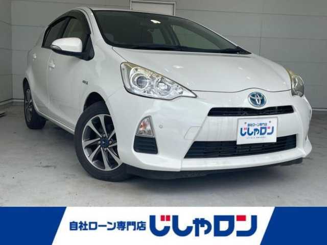 トヨタ アクア G ブラックソフトレザーセレ 沖縄県 2014(平26)年 6.8万km ライムホワイトパールクリスタルシャイン (株)IDOMが運営する【じしゃロンコザ店】の自社ローン専用車両になりますこちらは現金またはオートローンご利用時の価格です。自社ローンご希望の方は別途その旨お申付け下さい/純正ナビ　/フルセグＴＶ　/Ｂｌｕｅｔｏｏｔｈ接続　/バックカメラ　/ＥＴＣ　/レザーシート　/プッシュスタート　/スマートキー　/オートライト　/純正フロアマット　/モデリスタアルミホイール　/取扱説明書