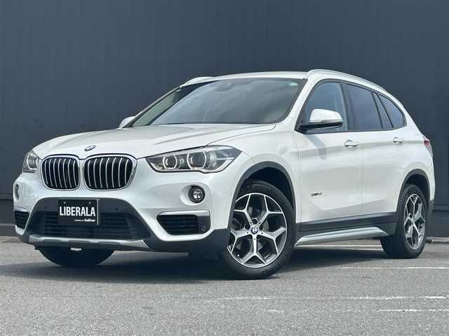 ＢＭＷ Ｘ１ sDrive 18i Xライン 茨城県 2017(平29)年 4.4万km ミネラルホワイト インテリジェントS/コンフォートA/純正HDDナビ/（AM.FM.CD.DVD.BT.USB）/バックカメラ/ミラー一体型ETC/ドライブレコーダー/ハーフレザーシート/D/N席シートヒーター/パワーバックドア/ステアリングスイッチ/スマートキー×2/保証書・取説