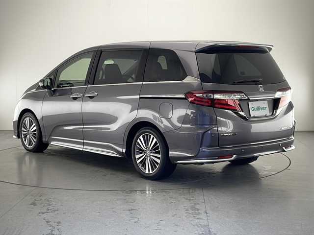 ホンダ オデッセイ アブソルート・EXホンダセンジング 宮崎県 2019(令1)年 5.5万km モダンスティールM 禁煙車/ホンダセンシング/社外ナビ/（ストラーダ/CN-BR300B/CD/FMAM/Bluetooth）/純正ビルトイン2.0ETC/純正LEDオートライト/純正フォグ/純正17インチアルミ/純正フロアマット/両側電動スライドドア/マルチビューモニター/アダプティブクルーズコントロール/レーンディパーチャーアラート/ブラインドスポットモニター/クリアランスソナー/ハーフレザーシート/前席シートヒーター/パワーシート/デュアルオートエアコン/黒木目調パネル/本革巻ハンドル/パドルシフト/ウインカードアミラー/スマートキー/プッシュエンジンスタート/スペアキー/新車時保証書/取扱い説明書