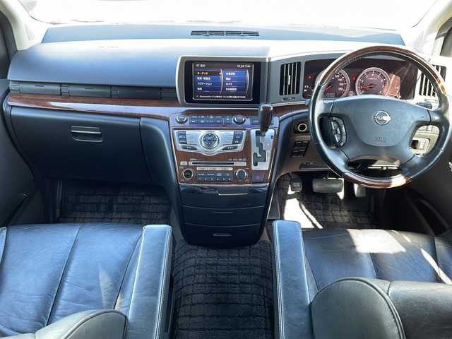 日産 エルグランド 250ハイウェイスター ブラックレザ-ナビ 徳島県 2009(平21)年 16.5万km ミスティックブラック 純正ナビ/（ラジオ/フルセグ/AUX/BT）/バックカメラ/フリップダウンモニター/オットマン/フォグライト/キセノンヘッドライト/D・N席シートヒーター/純正フロアマット/純正17インチアルミホイール/両側電動スライドドア/ウッド革巻きハンドル/ドアバイザー/電動格納ミラー