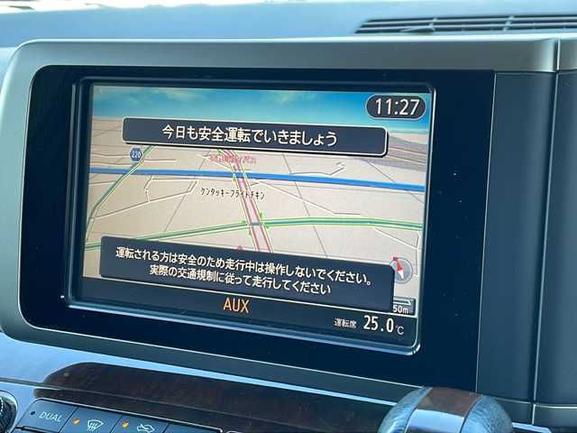 日産 エルグランド 250ハイウェイスター ブラックレザ-ナビ 徳島県 2009(平21)年 16.5万km ミスティックブラック 純正ナビ/（ラジオ/フルセグ/AUX/BT）/バックカメラ/フリップダウンモニター/オットマン/フォグライト/キセノンヘッドライト/D・N席シートヒーター/純正フロアマット/純正17インチアルミホイール/両側電動スライドドア/ウッド革巻きハンドル/ドアバイザー/電動格納ミラー