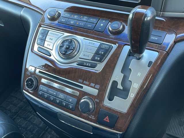 日産 エルグランド 250ハイウェイスター ブラックレザ-ナビ 徳島県 2009(平21)年 16.5万km ミスティックブラック 純正ナビ/（ラジオ/フルセグ/AUX/BT）/バックカメラ/フリップダウンモニター/オットマン/フォグライト/キセノンヘッドライト/D・N席シートヒーター/純正フロアマット/純正17インチアルミホイール/両側電動スライドドア/ウッド革巻きハンドル/ドアバイザー/電動格納ミラー