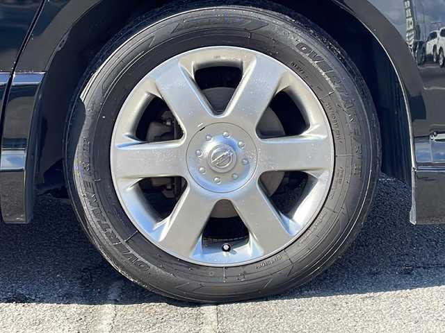 日産 エルグランド 250ハイウェイスター ブラックレザ-ナビ 徳島県 2009(平21)年 16.5万km ミスティックブラック 純正ナビ/（ラジオ/フルセグ/AUX/BT）/バックカメラ/フリップダウンモニター/オットマン/フォグライト/キセノンヘッドライト/D・N席シートヒーター/純正フロアマット/純正17インチアルミホイール/両側電動スライドドア/ウッド革巻きハンドル/ドアバイザー/電動格納ミラー