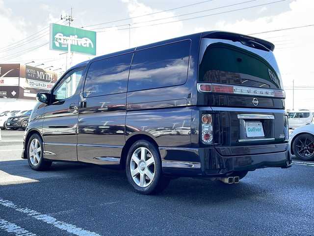 日産 エルグランド 250ハイウェイスター ブラックレザ-ナビ 徳島県 2009(平21)年 16.5万km ミスティックブラック 純正ナビ/（ラジオ/フルセグ/AUX/BT）/バックカメラ/フリップダウンモニター/オットマン/フォグライト/キセノンヘッドライト/D・N席シートヒーター/純正フロアマット/純正17インチアルミホイール/両側電動スライドドア/ウッド革巻きハンドル/ドアバイザー/電動格納ミラー