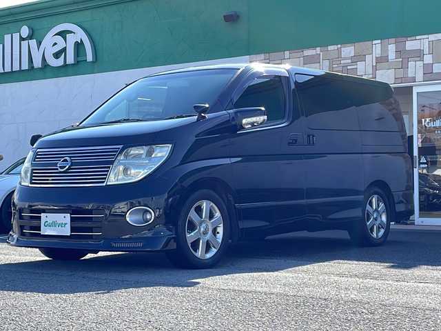 日産 エルグランド 250ハイウェイスター ブラックレザ-ナビ 徳島県 2009(平21)年 16.5万km ミスティックブラック 純正ナビ/（ラジオ/フルセグ/AUX/BT）/バックカメラ/フリップダウンモニター/オットマン/フォグライト/キセノンヘッドライト/D・N席シートヒーター/純正フロアマット/純正17インチアルミホイール/両側電動スライドドア/ウッド革巻きハンドル/ドアバイザー/電動格納ミラー