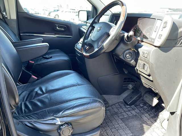 日産 エルグランド 250ハイウェイスター ブラックレザ-ナビ 徳島県 2009(平21)年 16.5万km ミスティックブラック 純正ナビ/（ラジオ/フルセグ/AUX/BT）/バックカメラ/フリップダウンモニター/オットマン/フォグライト/キセノンヘッドライト/D・N席シートヒーター/純正フロアマット/純正17インチアルミホイール/両側電動スライドドア/ウッド革巻きハンドル/ドアバイザー/電動格納ミラー