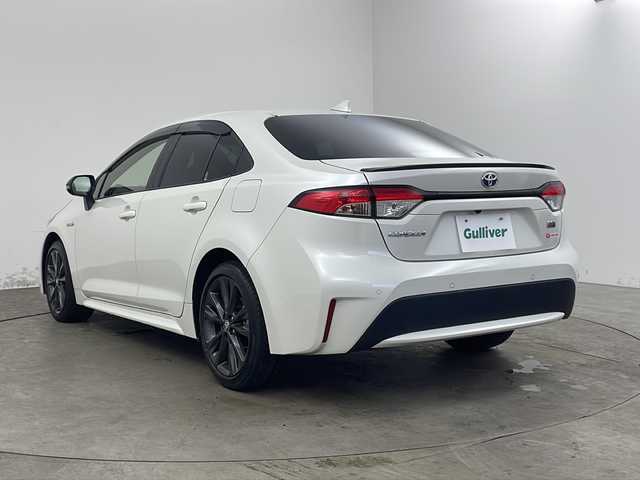 トヨタ カローラ ハイブリット ダブルバイビー 兵庫県 2020(令2)年 5.2万km ホワイトパールクリスタルシャイン ・純正ディスプレイオーディオ/・Bluetooth/USB/AM/FM/TV//Apple carplay/Android Auto/・バックカメラ/・ビルトインETC/・Toyota　Safety　Sense/・プリクラッシュセーフティ/・レーントレーシングアシスト/・レーダークルーズコントロール全車速追従機能付/・オートマチックハイビーム/・ロードサインアシスト/・インテリジェントクリアランスソナー/・パーキングサポートブレーキ/・ブラインドスポットモニター/・リヤクロストラフィックアラート/・先行車発進告知/・革巻きステアリング/・純正１７インチアルミホイール/・ＬＥＤヘッドライト/・オートライト/・フォグランプ/・ハーフレザー/・社外フロアマット/・スマートキー/・プッシュスタート