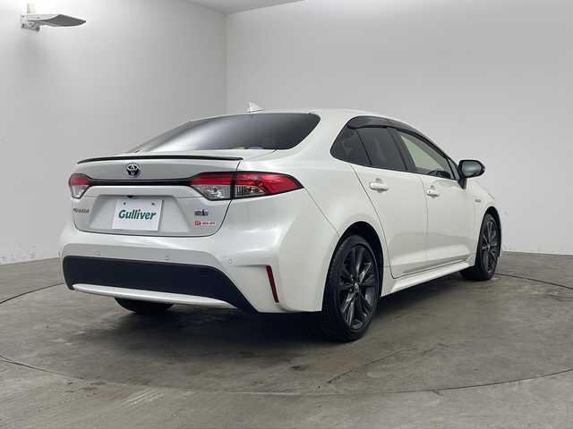 トヨタ カローラ ハイブリット ダブルバイビー 兵庫県 2020(令2)年 5.2万km ホワイトパールクリスタルシャイン ・純正ディスプレイオーディオ/・Bluetooth/USB/AM/FM/TV//Apple carplay/Android Auto/・バックカメラ/・ビルトインETC/・Toyota　Safety　Sense/・プリクラッシュセーフティ/・レーントレーシングアシスト/・レーダークルーズコントロール全車速追従機能付/・オートマチックハイビーム/・ロードサインアシスト/・インテリジェントクリアランスソナー/・パーキングサポートブレーキ/・ブラインドスポットモニター/・リヤクロストラフィックアラート/・先行車発進告知/・革巻きステアリング/・純正１７インチアルミホイール/・ＬＥＤヘッドライト/・オートライト/・フォグランプ/・ハーフレザー/・社外フロアマット/・スマートキー/・プッシュスタート