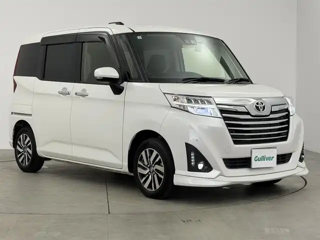 トヨタ ルーミー カスタムG 愛知県 2019(平31)年 2.3万km パールホワイトⅢ スマートアシスト/純正9インチナビ/（Bluetooth/CD/DVD/AM/FM）/バックカメラ/クルーズコントロール/ETC/両側パワースライドドア/前席シートヒーター/オートライト/純正LEDライト/純正AW/電動格納ミラー/後席テーブル/コーナーセンサー/プッシュスタート/スマートキー