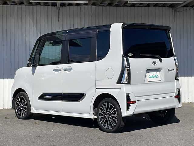 ダイハツ タント カスタム RS 長野県 2022(令4)年 2.7万km ブラックマイカメタリック/シャイニングホワイトパール ４WD/純正９型メモリナビフルセグTV/バックカメラ/ビルトインETC/両側パワースライドドア/ハーフレザーシート/純正15インチアルミ/シートヒーター /レーンキープアシスト/オートハイビーム/ワンオーナー /保証書・取説/スペアキー