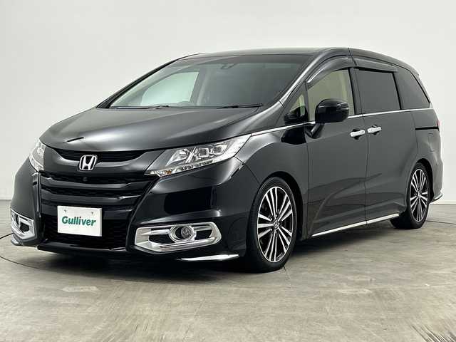 ホンダ オデッセイ アブソルート 三重県 2013(平25)年 3.1万km クリスタルブラックパール /禁煙車//社外ナビ/（CD.DVD.SD.BT）//フルセグTV//両側パワースライドドア//フリップダウンモニター//ビルトインETC//クルーズコントロール//LEDヘッドライト//車高調（純正サスあり）//後席オットマン//アイドリングストップ//パドルシフト//ステアリングスイッチ//スマートキー