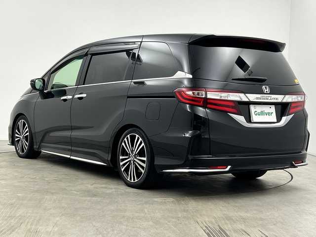 ホンダ オデッセイ アブソルート 三重県 2013(平25)年 3.1万km クリスタルブラックパール /禁煙車//社外ナビ/（CD.DVD.SD.BT）//フルセグTV//両側パワースライドドア//フリップダウンモニター//ビルトインETC//クルーズコントロール//LEDヘッドライト//車高調（純正サスあり）//後席オットマン//アイドリングストップ//パドルシフト//ステアリングスイッチ//スマートキー