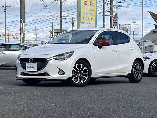 マツダ デミオ XD ツーリング 愛知県 2014(平26)年 10.6万km スノーフレイクホワイトパールマイカ /禁煙//ワンオーナー//エアロ（フロント・サイド・リアアンダー）//純正ナビ//CD/DVD/BT/USB/フルセグ//純正16W//ETC//クルーズコントロール//プリクラッシュセーフティ/車線逸脱警報//スマートシティーブレーキサポート/ハイビームコントロールシステム//ブラインドスポットモニタリング/リアクロストラフィックアラート//アイドリングストップ/横滑り防止装置/盗難防止装置//パドルシフト//LEDオートライト/LEDフォグランプ//オートリトラウィンカーミラー//革巻きステアリング/ステアリングスイッチ//バニティミラー//純正フロアマット//トノカバー//スペアスマートキー//新車時保証書//取扱説明書//ナビ取扱説明書//ディーラー記録簿　H27/H28/H29/H30/R1/R2/R3/R4/R5/R6/R7//ミラーカバー（白）積込