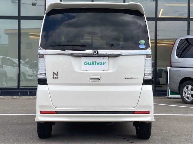 ホンダ Ｎ ＢＯＸ カスタム G 青森県 2013(平25)年 10.4万km プレミアムホワイトパール ・両側パワースライドドア/・LEDランプ/・純正14インチAW(サマー)付き/・スマートキー/・アイドリングストップ機能/・ブラインドスポットアシストミラー/・左右独立式リアセンターアームレスト /・運転席ハイトアジャスター/・ディスチャージヘッドライト/・本革巻セレクトレバー